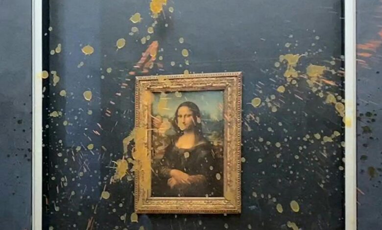 Mona lisa louvre protesters soup