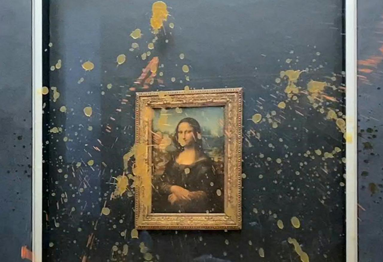 Mona lisa louvre protesters soup