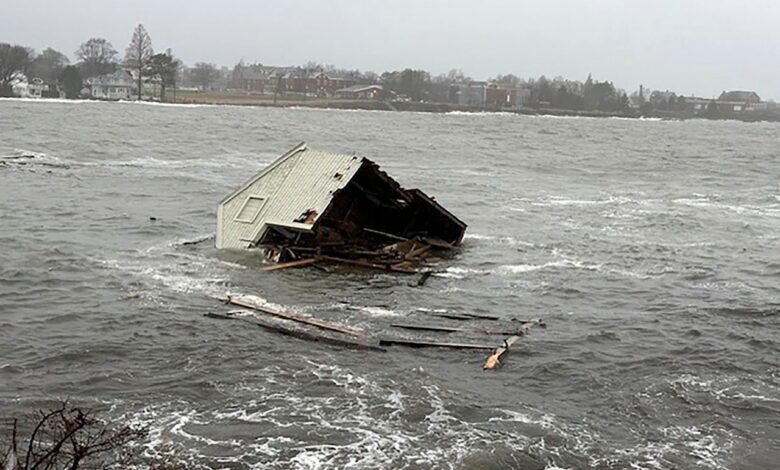 Maine fishing shacks tide storms