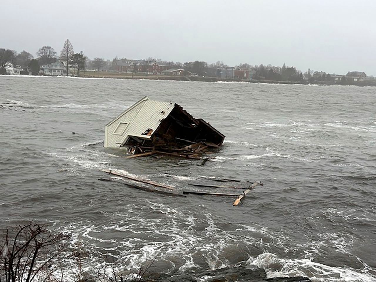 Maine fishing shacks tide storms