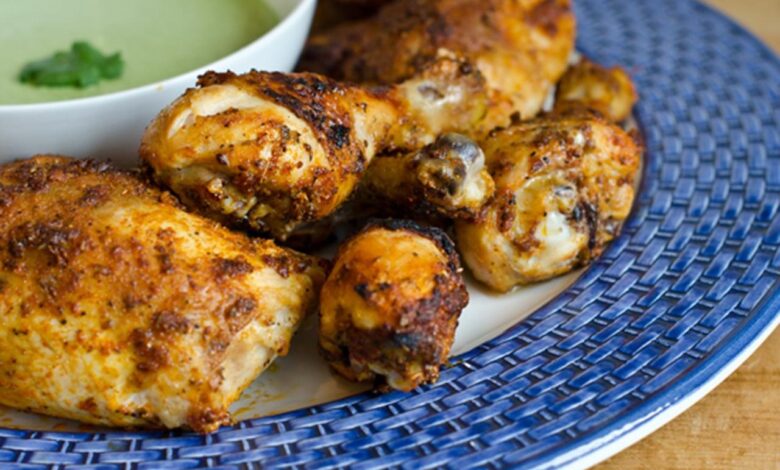 Golden peruvian roasted chicken with a brilliant spicy sauce