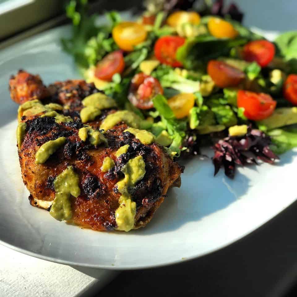 Golden peruvian roasted chicken with a brilliant spicy sauce